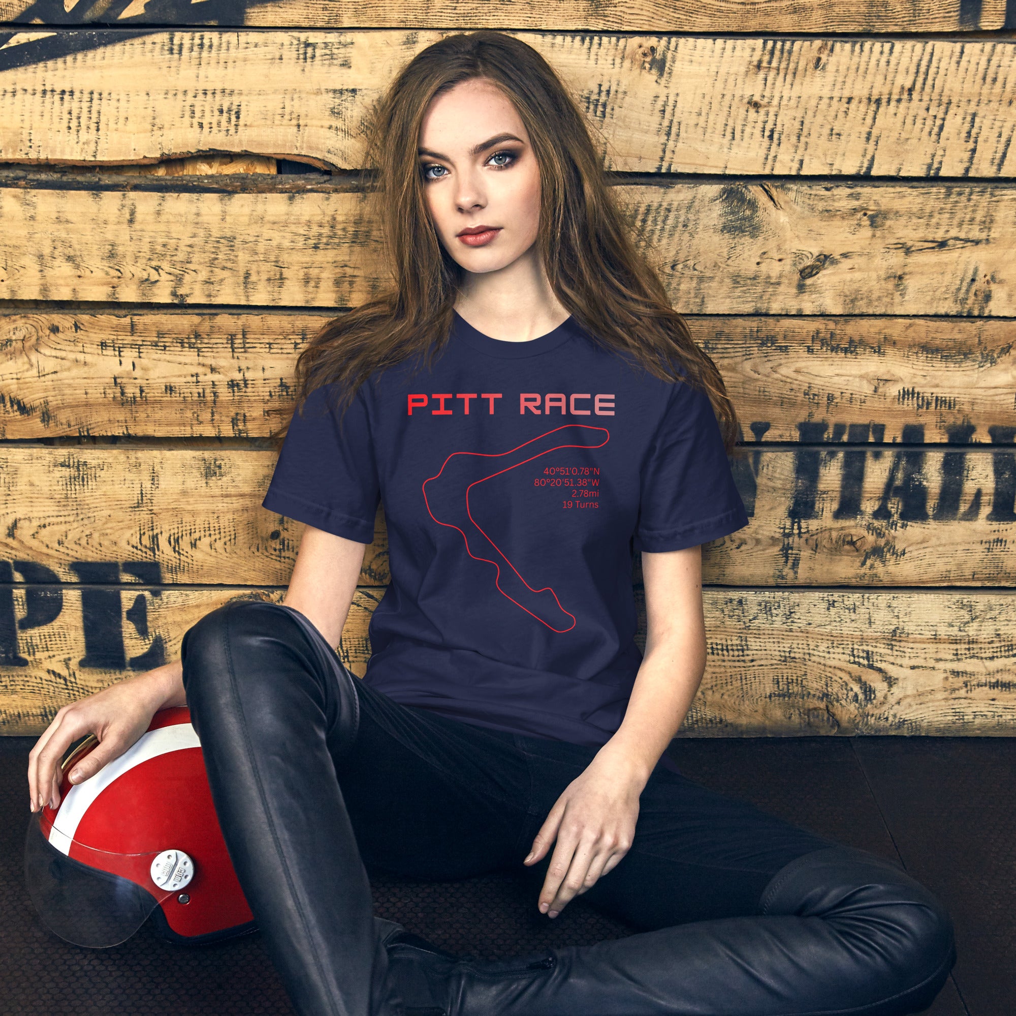 Tee shirt featuring the now closed Pittsburgh National Raceway featuring a simple one line design of the track in red with the track location, length, and number of turns with text above that says "Pitt Race"
